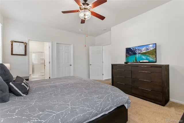 a bedroom with a bed and furniture