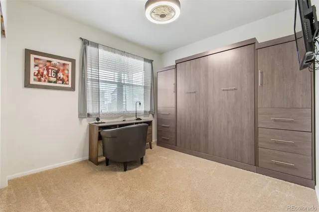 a room with a bed and a window