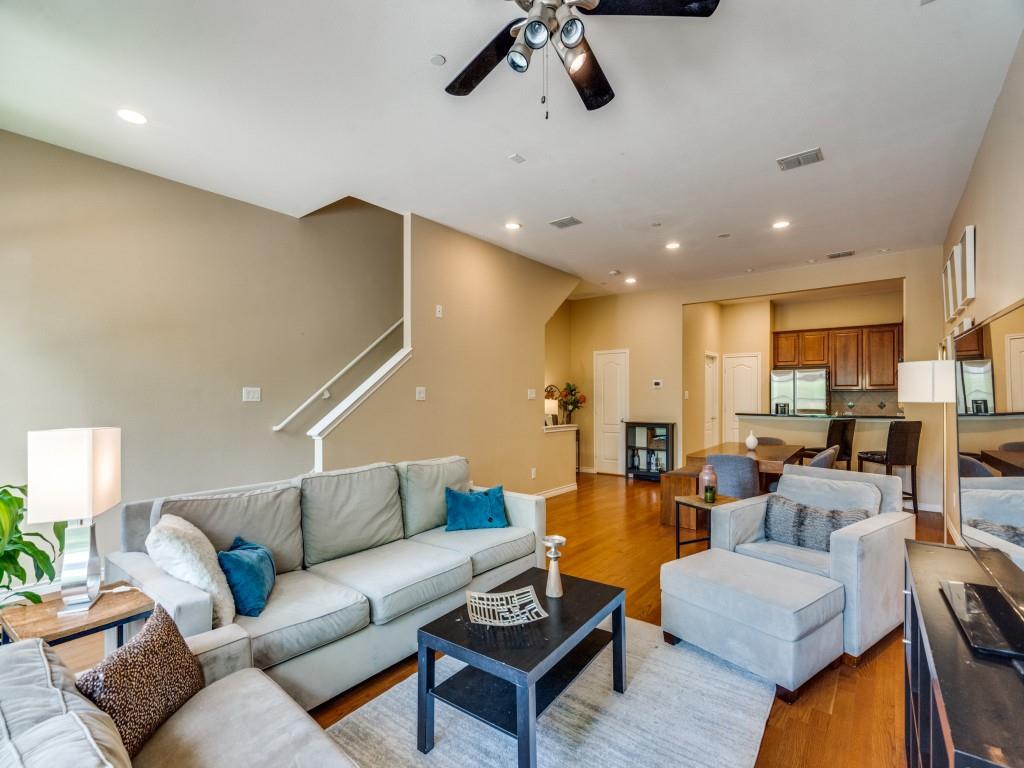 15711 Spectrum Drive, Unit 80 Addison, TX 75001 - Photo 6 of 26 a living room with furniture kitchen view and a chandelier