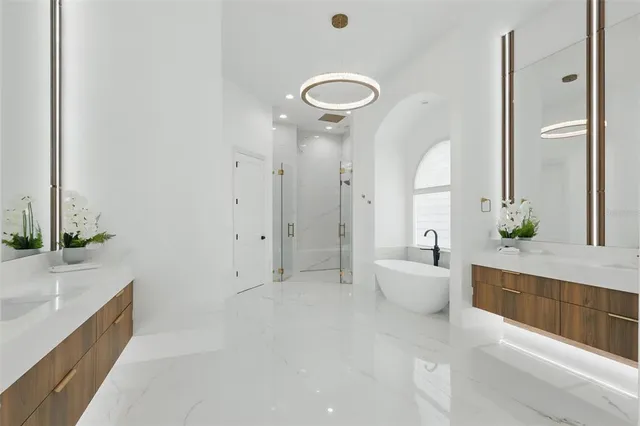 a view of a livingroom with furniture and windows