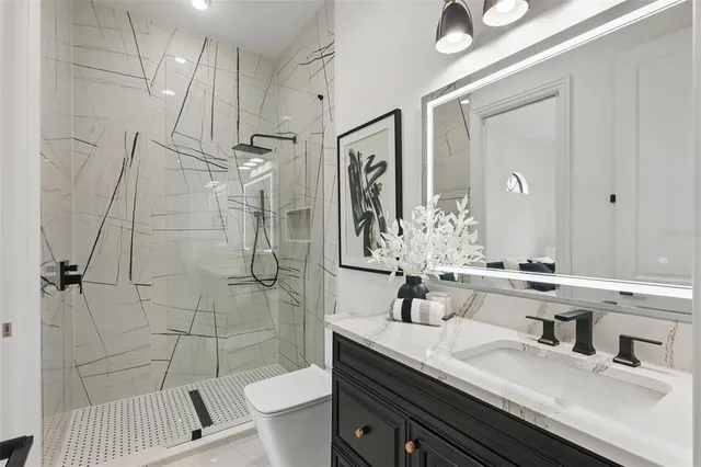 an aerial view of a house with a garden