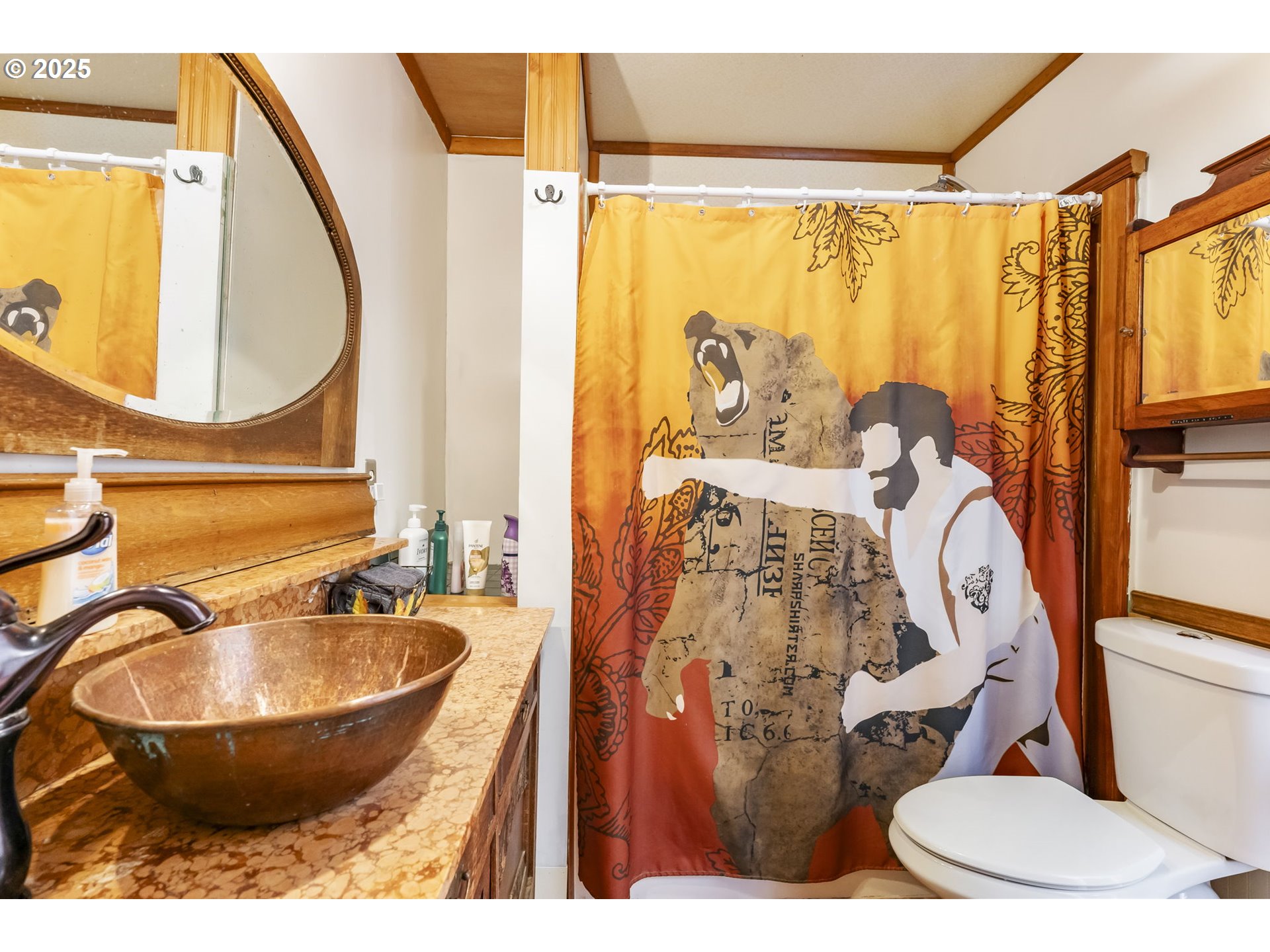 162 Riverside Drive Idanha, OR 97350 - Photo 13 of 40 a bathroom with a sink and mirror with bathtub