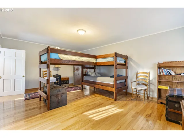 a room with furniture and a wooden floor