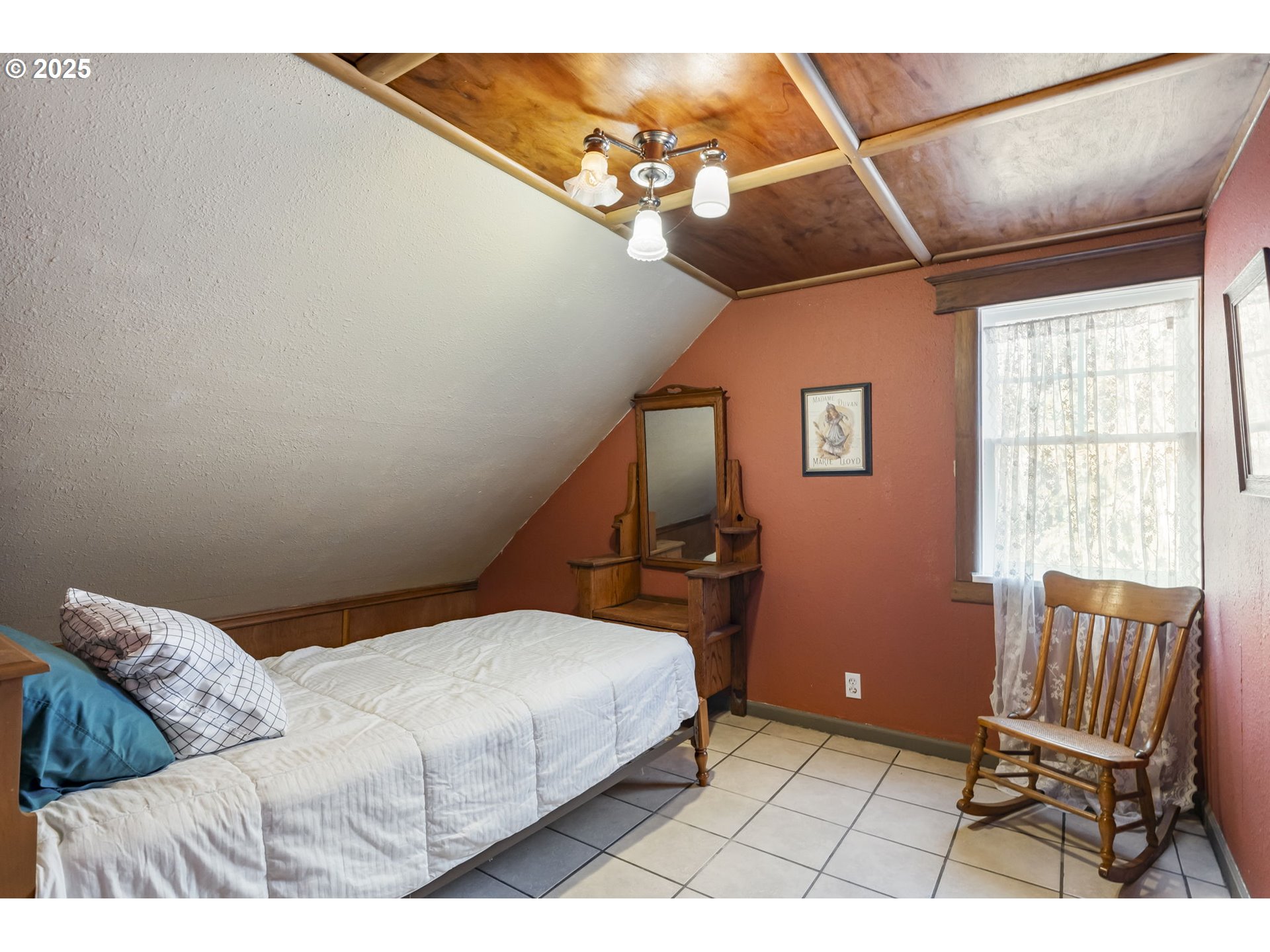 162 Riverside Drive Idanha, OR 97350 - Photo 24 of 40 a bedroom with a bed and wooden floor