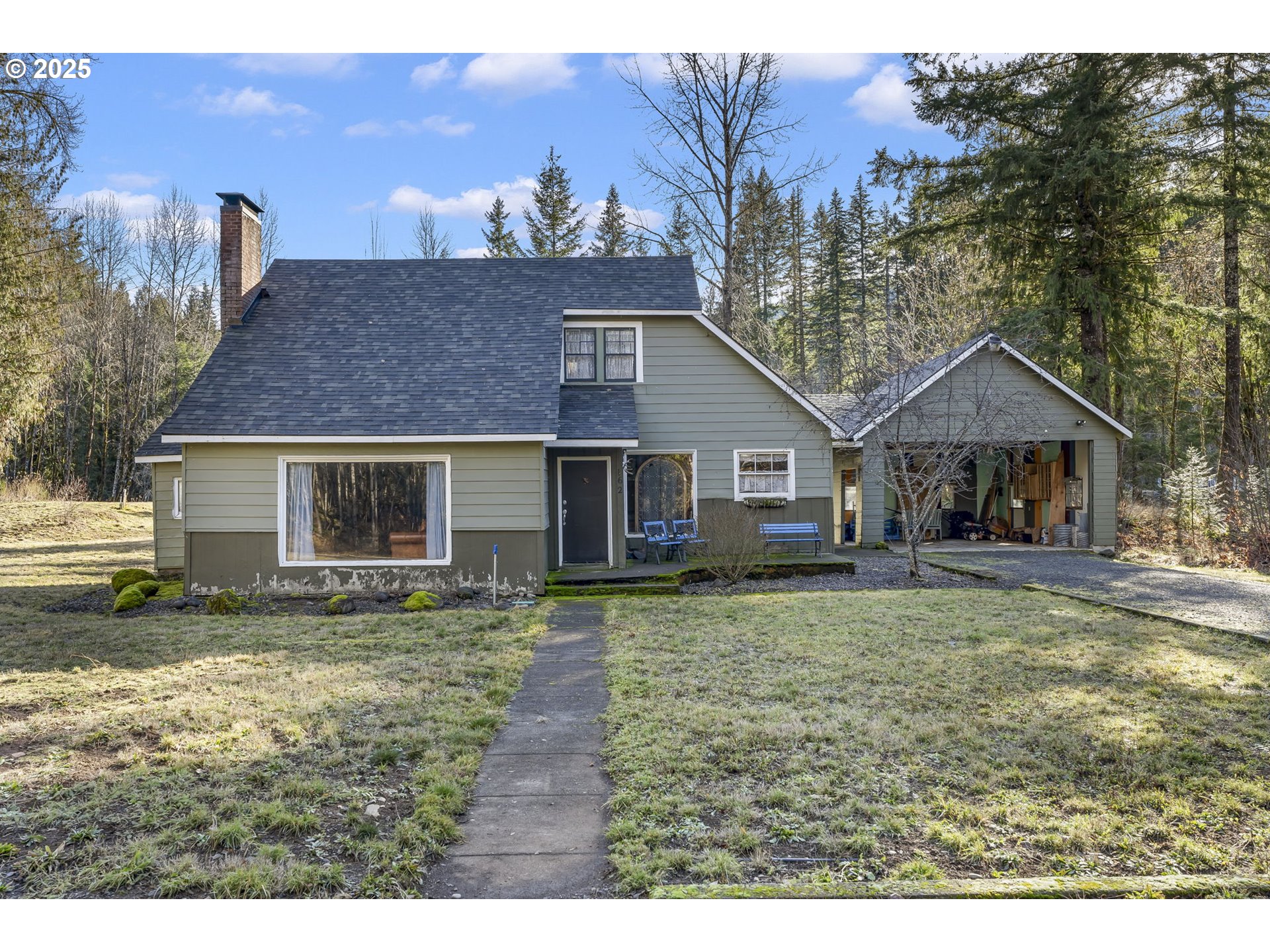 162 Riverside Drive Idanha, OR 97350 - Photo 30 of 40 a front view of a house with a yard and trees