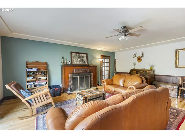 a living room with furniture a fireplace