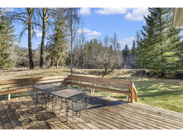 a view of a swimming pool with an outdoor seating