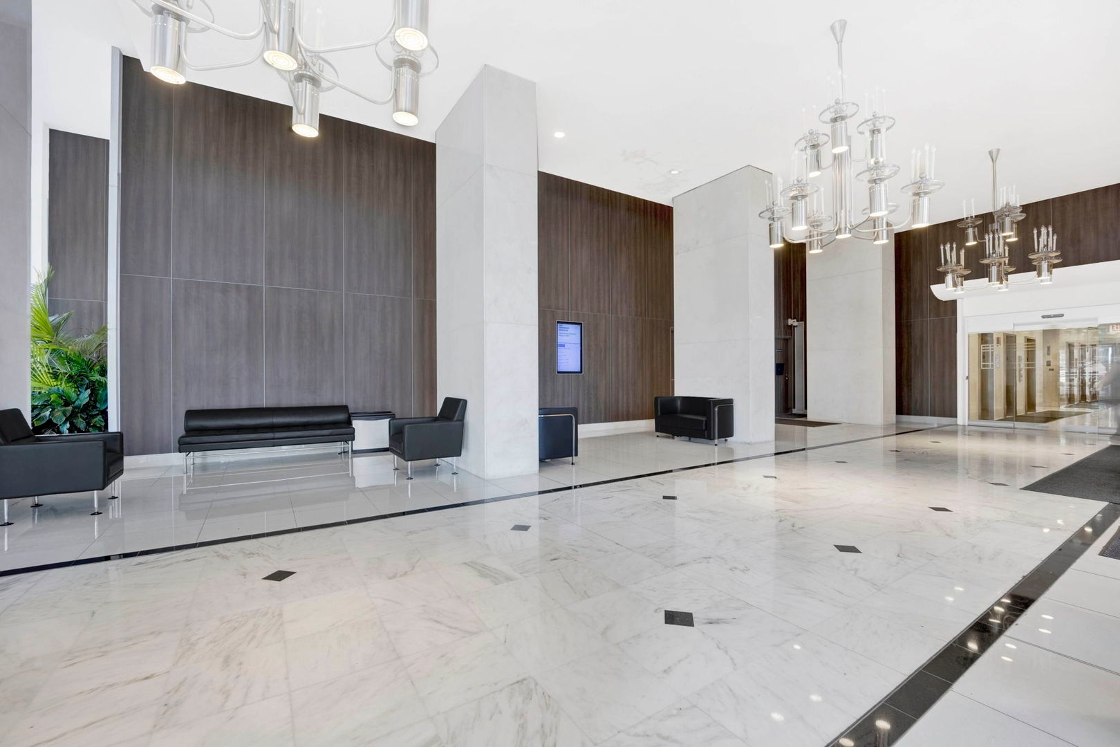 1550 North Lake Shore Drive, Unit 3C Chicago, IL 60610 - Photo 15 of 16 a bathroom with a granite countertop sink and a mirror