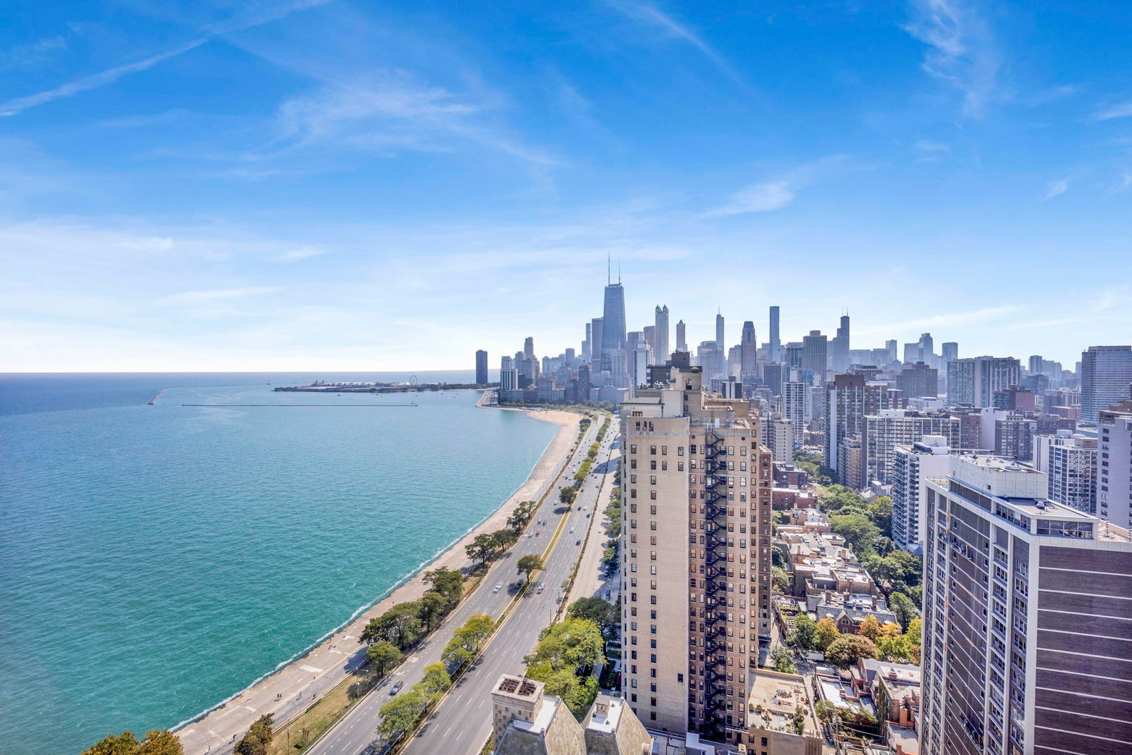 1550 North Lake Shore Drive, Unit 3C Chicago, IL 60610 - Photo 2 of 16 a view of a city with a lake