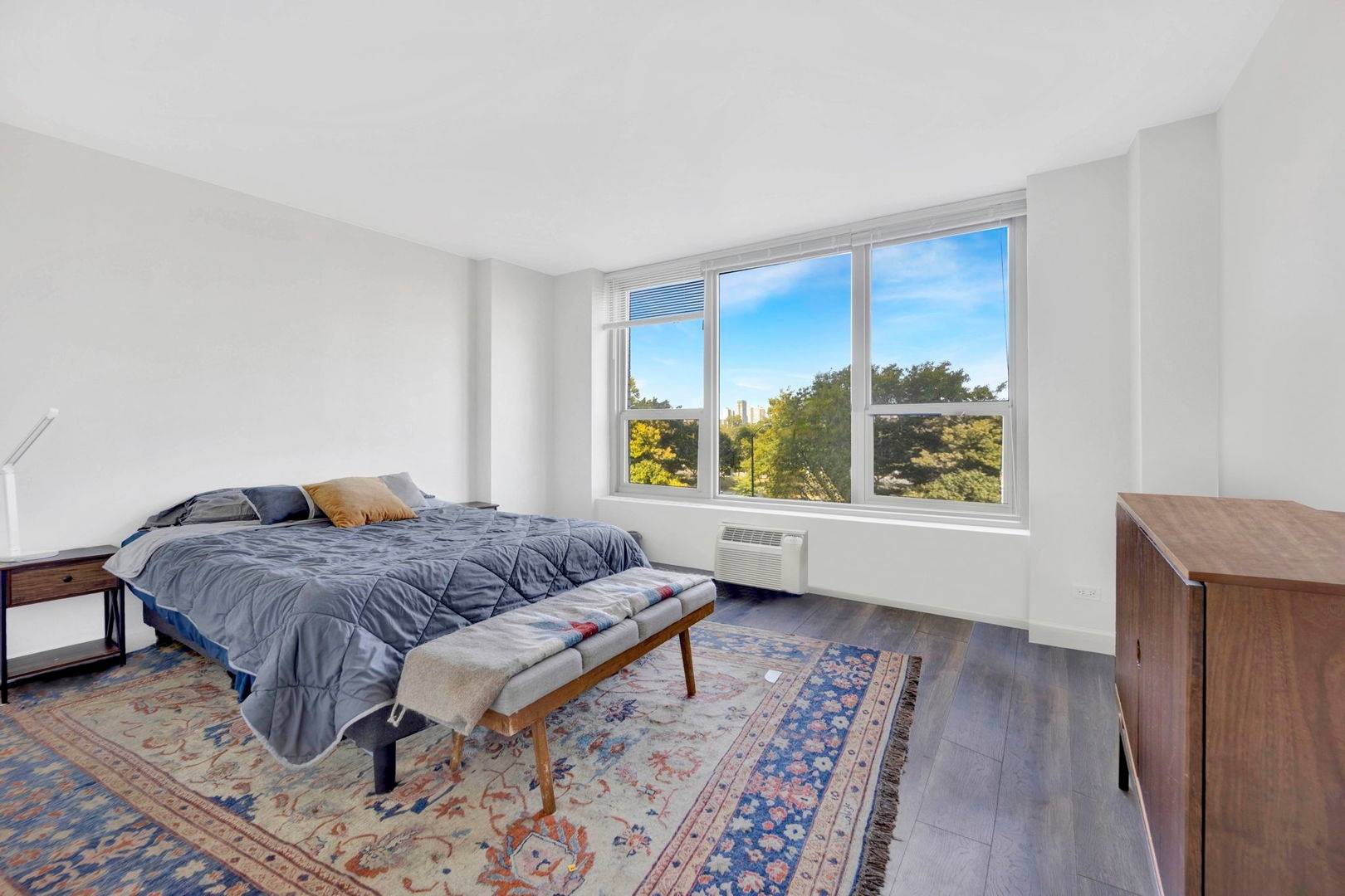 1550 North Lake Shore Drive, Unit 3C Chicago, IL 60610 - Photo 7 of 16 a living room with a couch and a window