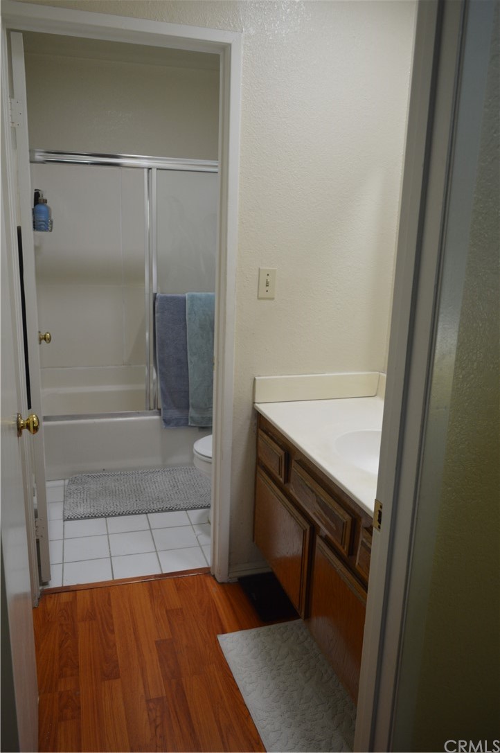 5577 Pioneer Boulevard, Unit 9 Whittier, CA 90601 - Photo 23 of 45 a bathroom with a sink and a shower