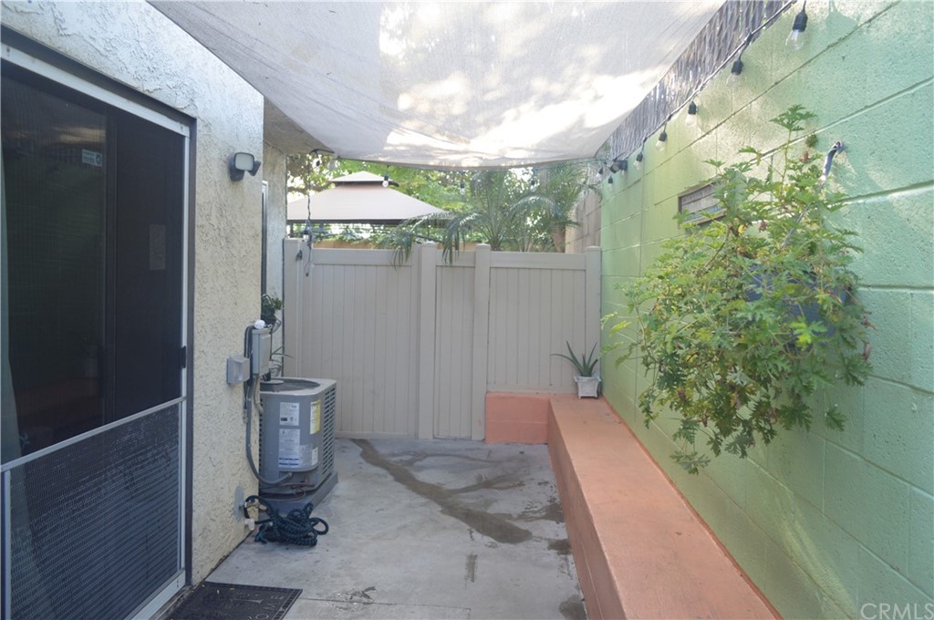 5577 Pioneer Boulevard, Unit 9 Whittier, CA 90601 - Photo 33 of 45 a backyard of a house