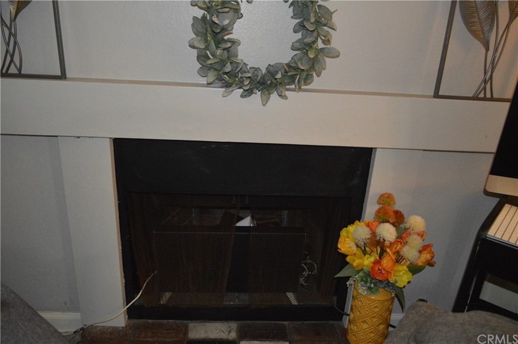 5577 Pioneer Boulevard, Unit 9 Whittier, CA 90601 - Photo 7 of 45 a vase of flowers sitting on a shelf