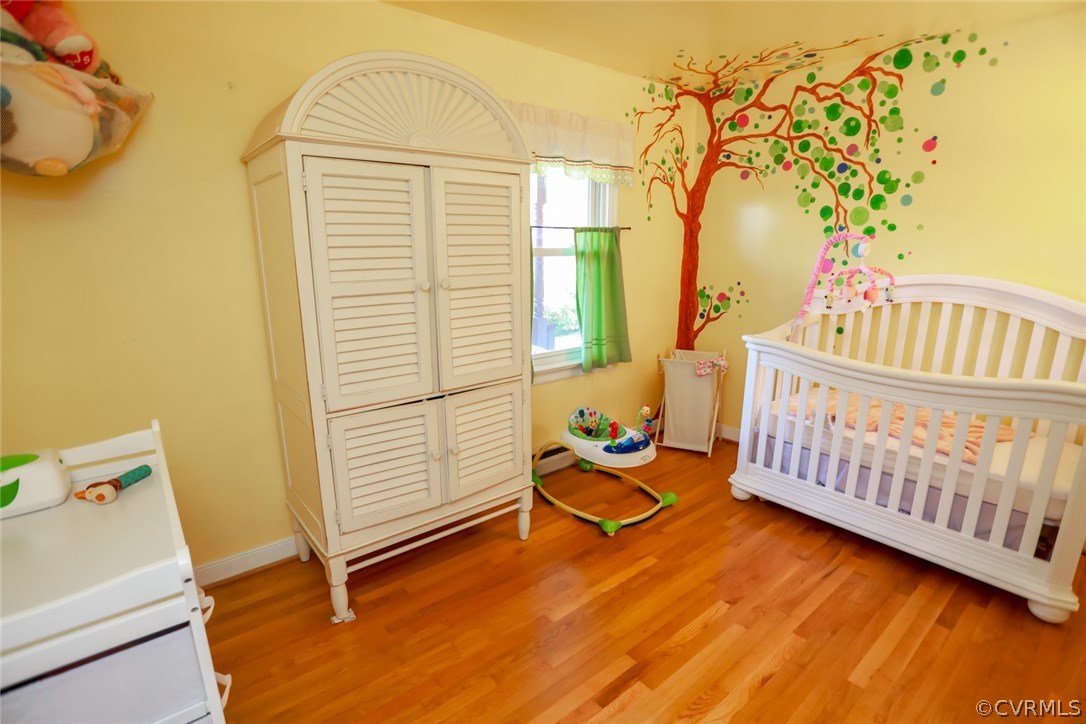 3350 Clintwood Road Midlothian, VA 23112 - Photo 12 of 18 a view of a room with furniture and wooden floor