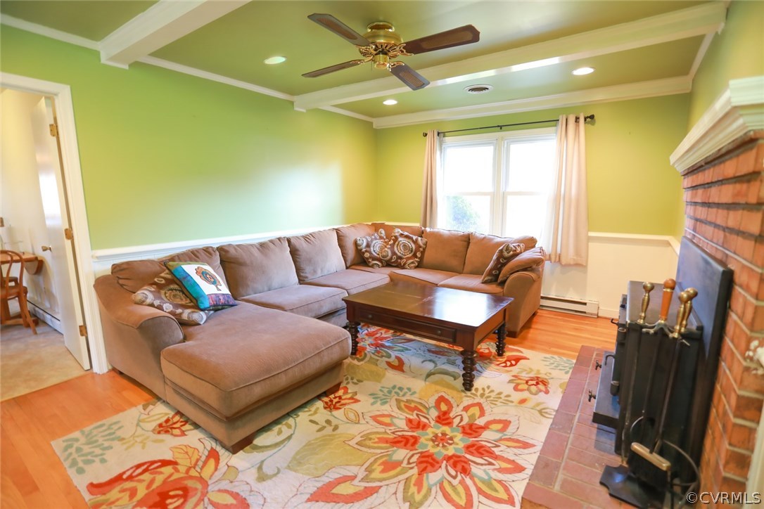3350 Clintwood Road Midlothian, VA 23112 - Photo 3 of 18 a living room with furniture a flat screen tv and a window