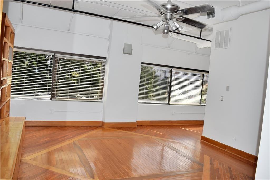 120 Ralph McGill Boulevard Northeast, Unit 402 Atlanta, GA 30308 - Photo 11 of 38 a view of an empty room with a window