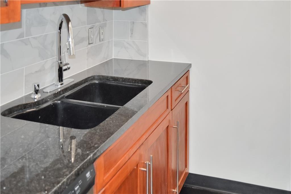 120 Ralph McGill Boulevard Northeast, Unit 402 Atlanta, GA 30308 - Photo 16 of 38 a close view of sink and tap