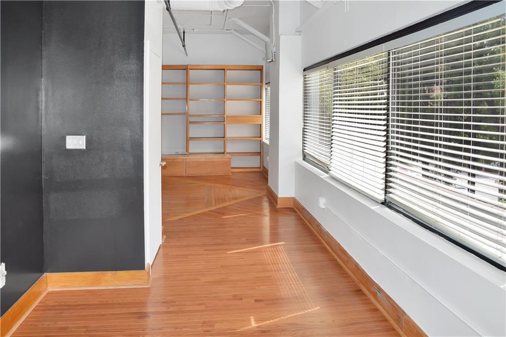 120 Ralph McGill Boulevard Northeast, Unit 402 Atlanta, GA 30308 - Photo 20 of 38 a view of a balcony with an outdoor space