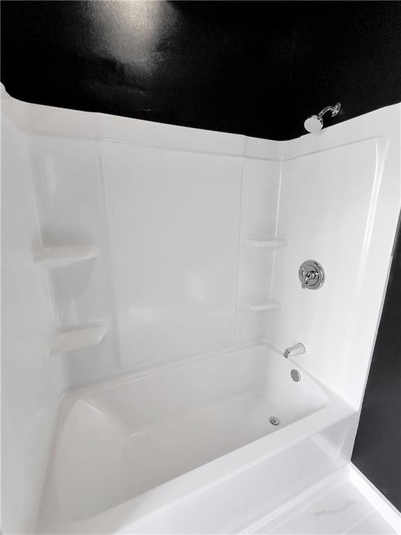 120 Ralph McGill Boulevard Northeast, Unit 402 Atlanta, GA 30308 - Photo 26 of 38 a bathroom with a bathtub