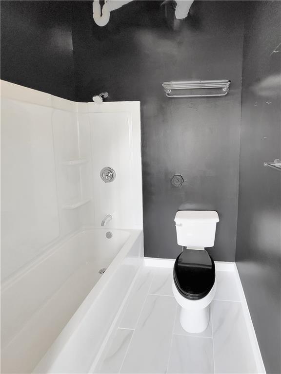 120 Ralph McGill Boulevard Northeast, Unit 402 Atlanta, GA 30308 - Photo 30 of 38 a bathroom with a toilet and a sink