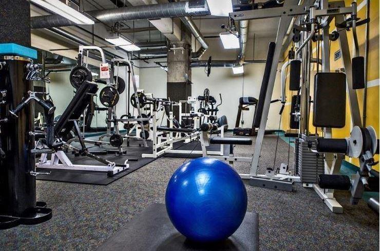 120 Ralph McGill Boulevard Northeast, Unit 402 Atlanta, GA 30308 - Photo 34 of 38 a view of a room with gym equipment
