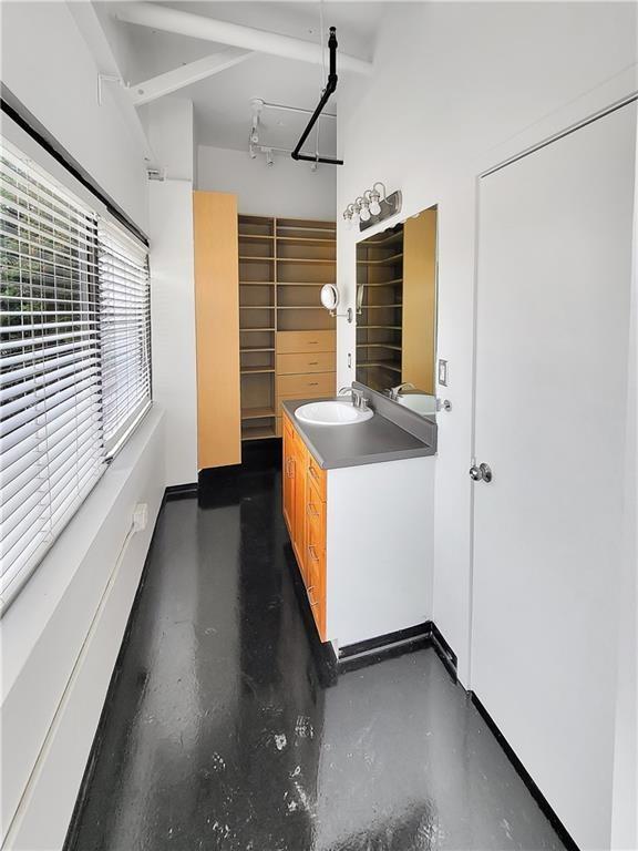 120 Ralph McGill Boulevard Northeast, Unit 402 Atlanta, GA 30308 - Photo 5 of 38 a view of a kitchen with a sink and a large window