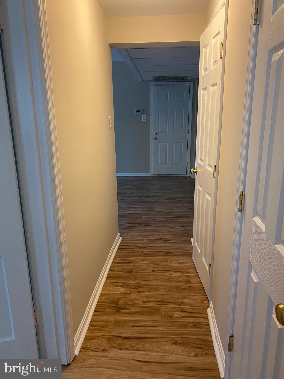 1805 Key Boulevard, Unit 511 Arlington, VA 22201 - Photo 13 of 26 a view of a hallway with wooden floor
