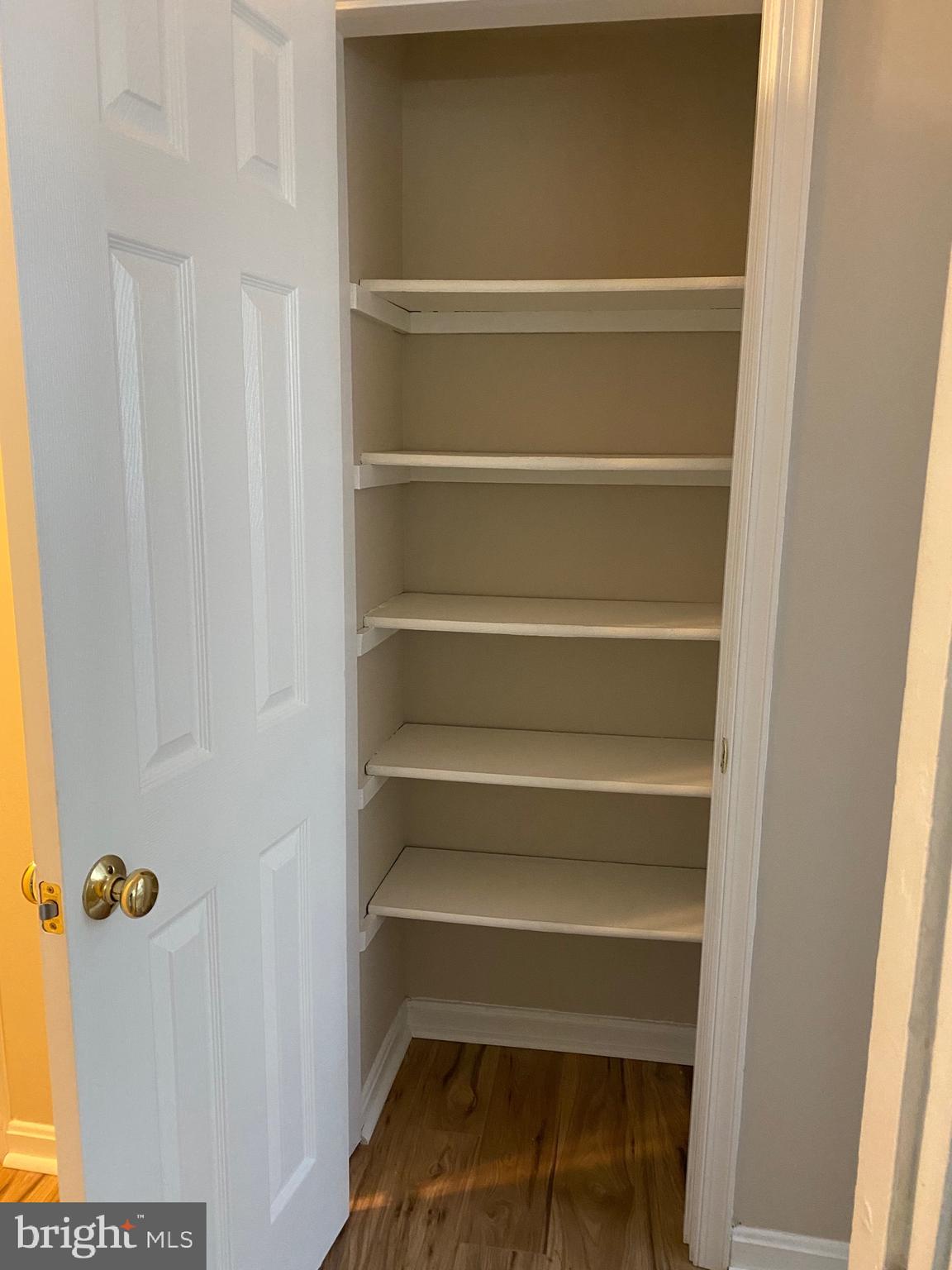 1805 Key Boulevard, Unit 511 Arlington, VA 22201 - Photo 19 of 26 a view of walk in closet with empty racks
