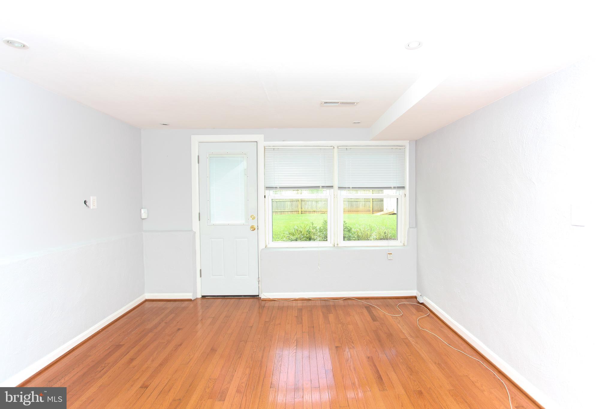 6003 Johnnycake Road Catonsville, MD 21228 - Photo 32 of 47 Family Room with Rear Entrance