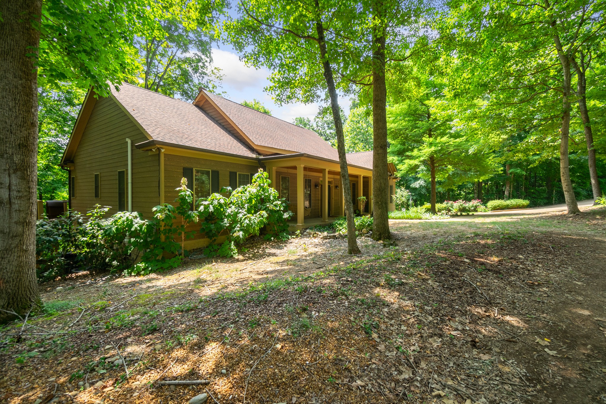 3000 Jubilee Ridge Road Franklin, TN 37069 - Photo 4 of 55 a view of a house with yard and a garden