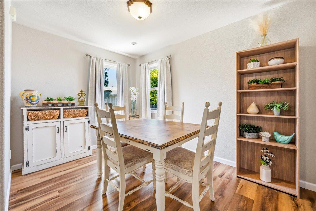 232 Upper Slate Creek Road Grass Valley, CA 95945 - Photo 7 of 48 a dining room with furniture and window