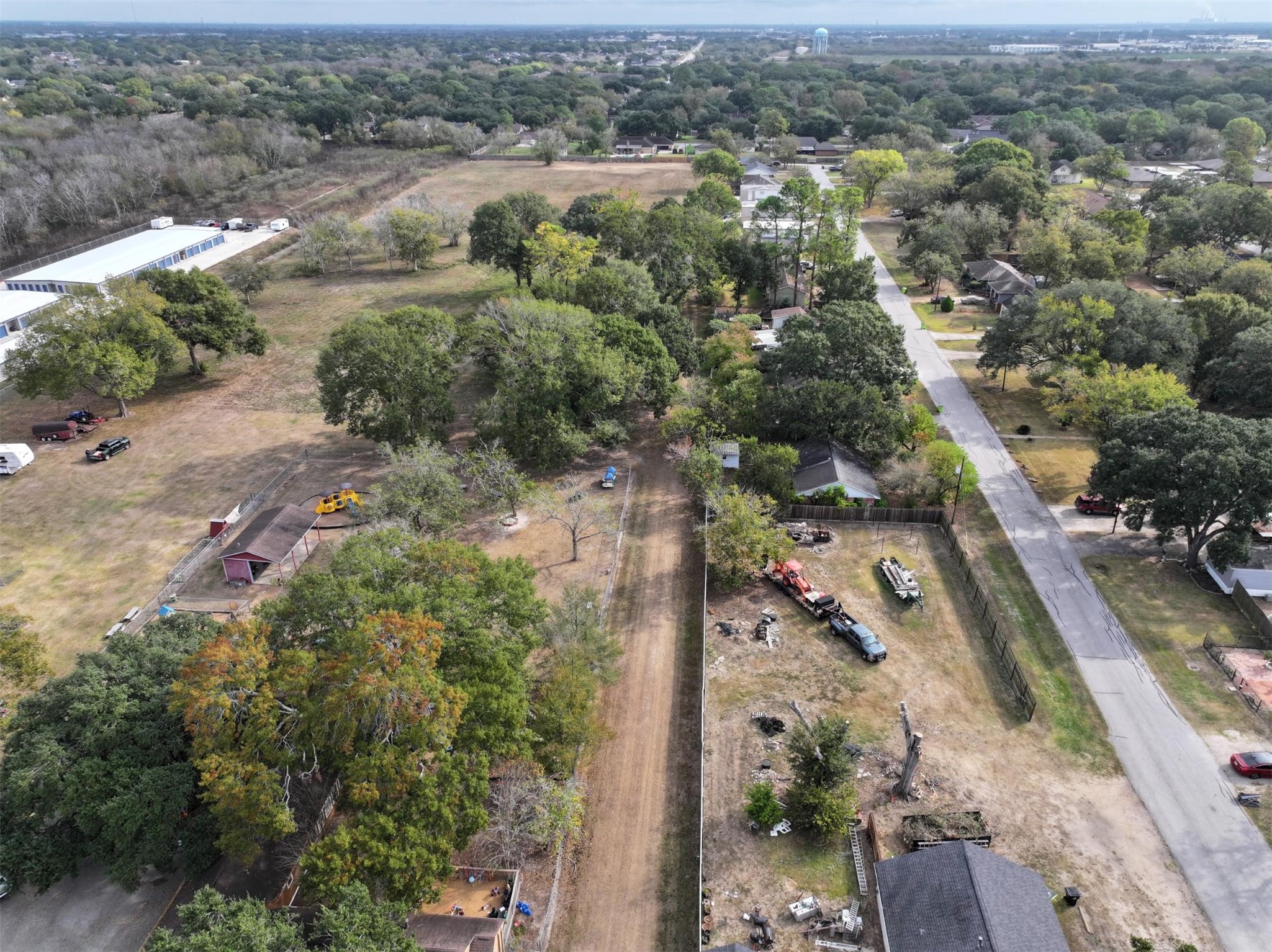 2417 4th Street Rosenberg, TX 77471 - Photo 11 of 50 an aerial view of residential houses with outdoor space
