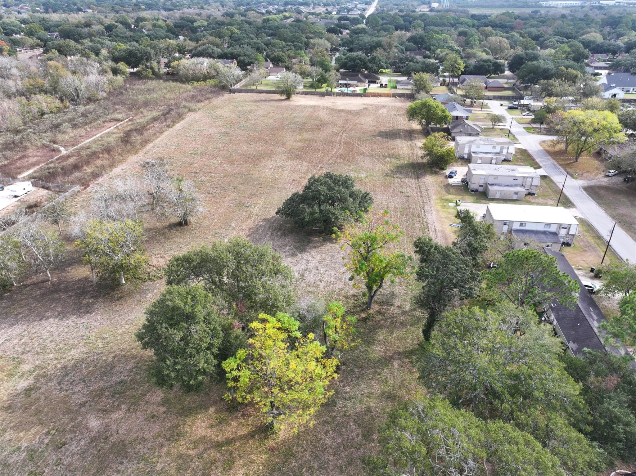 2417 4th Street Rosenberg, TX 77471 - Photo 16 of 50 a view of a yard with plants