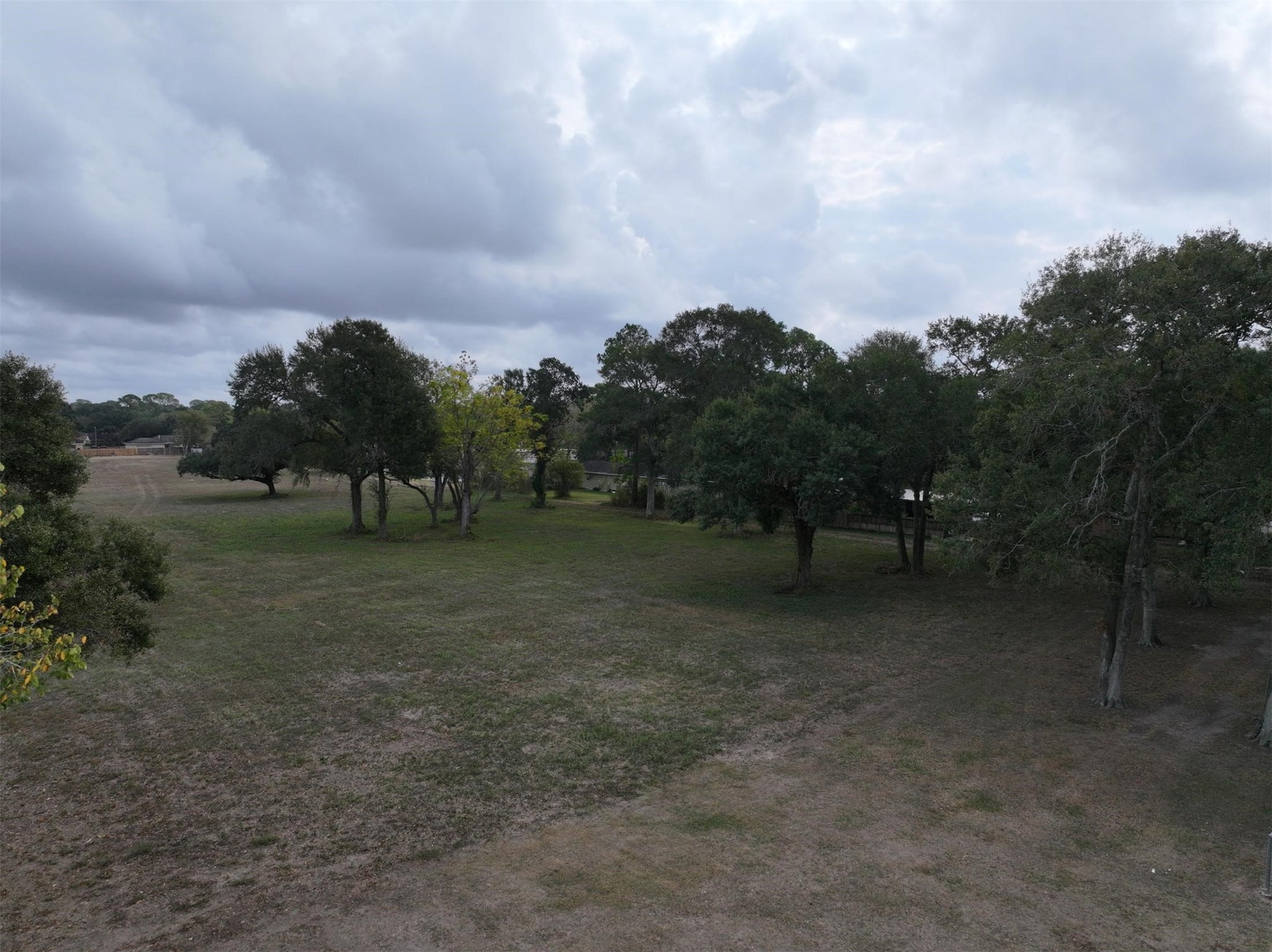 2417 4th Street Rosenberg, TX 77471 - Photo 2 of 50 a view of a field with trees in background