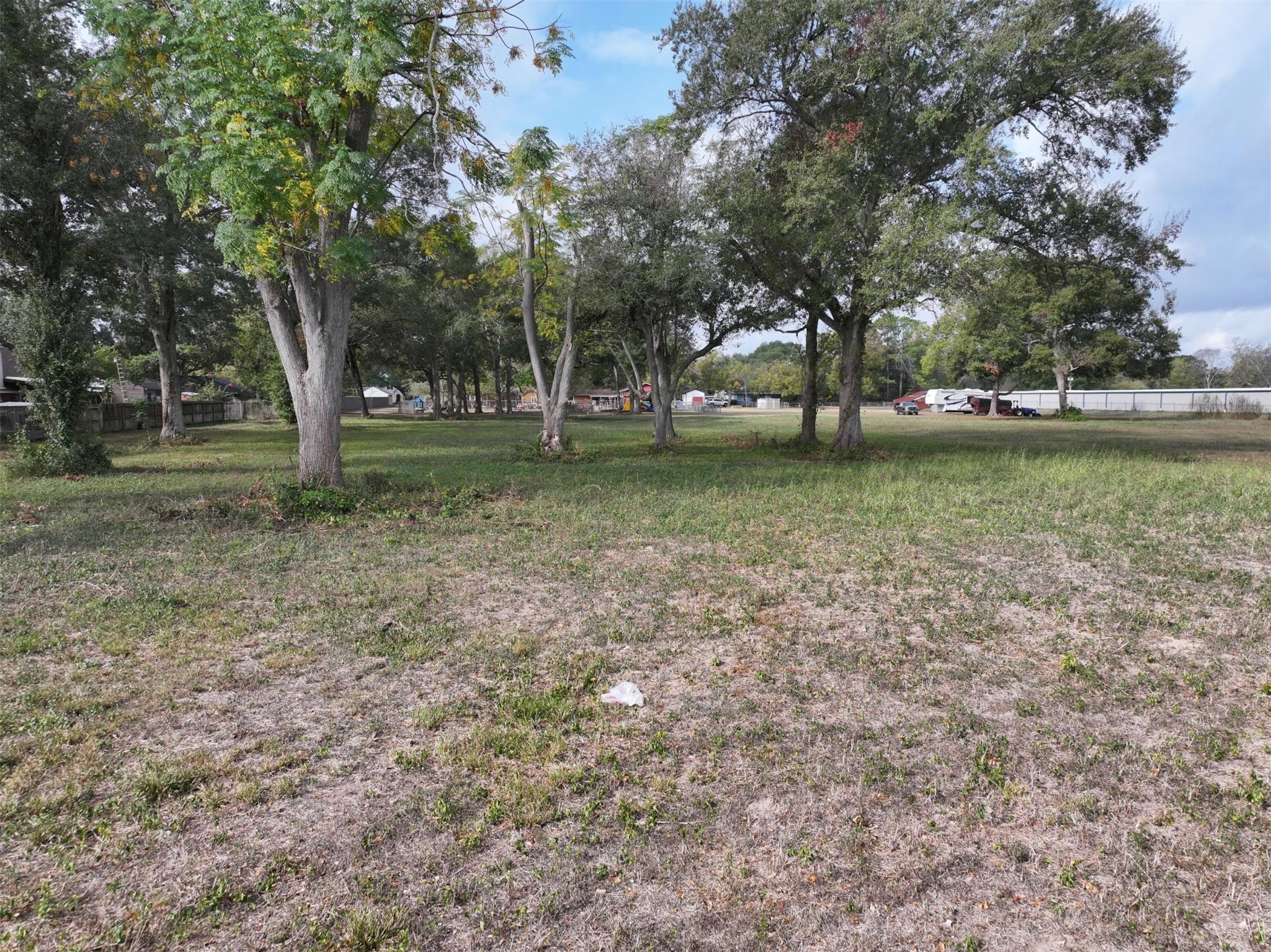 2417 4th Street Rosenberg, TX 77471 - Photo 31 of 50 a view of outdoor space with trees