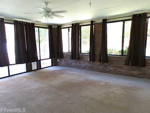 3161 Alamance Church Road Julian, NC 27283 - Photo 15 of 16 Sunroom.