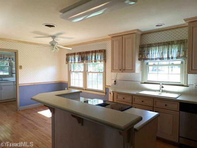 3161 Alamance Church Road Julian, NC 27283 - Photo 6 of 16 Kitchen. Corian Countertops in main floor kitchen.