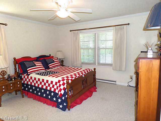 3161 Alamance Church Road Julian, NC 27283 - Photo 10 of 16 Master Bedroom. Master has 2 closets (1 is a walk in).