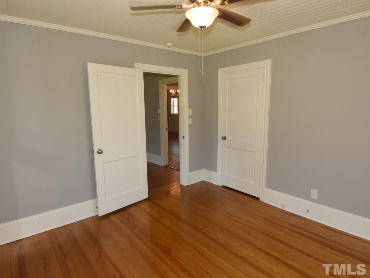 1525 Micro Road Selma, NC 27576 - Photo 15 of 25 bedroom with fresh paint, beadboard ceiling, wide baseboards