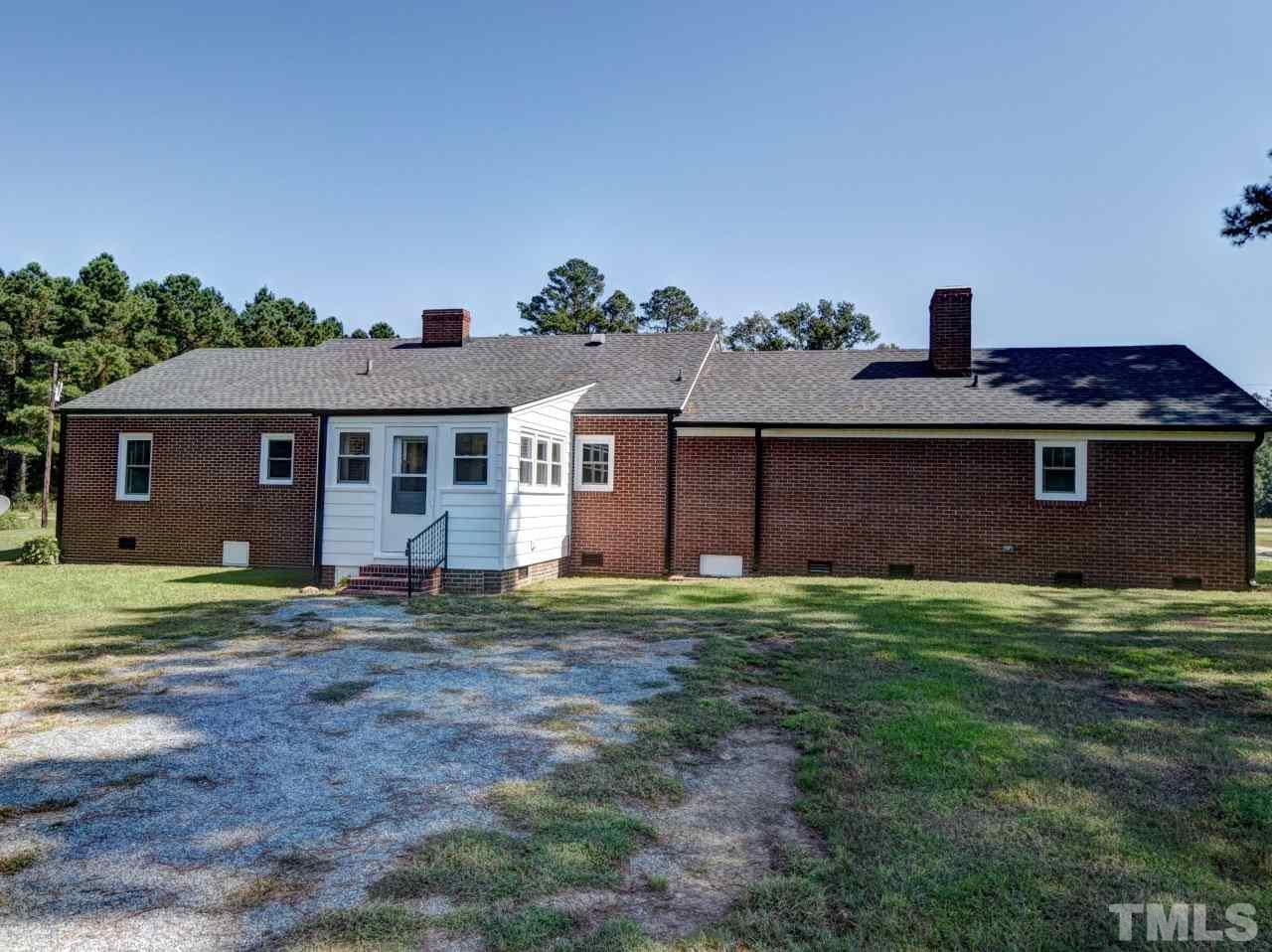 1525 Micro Road Selma, NC 27576 - Photo 18 of 25 Huge 1.72 acre backyard. No restrictive covenants,garden area