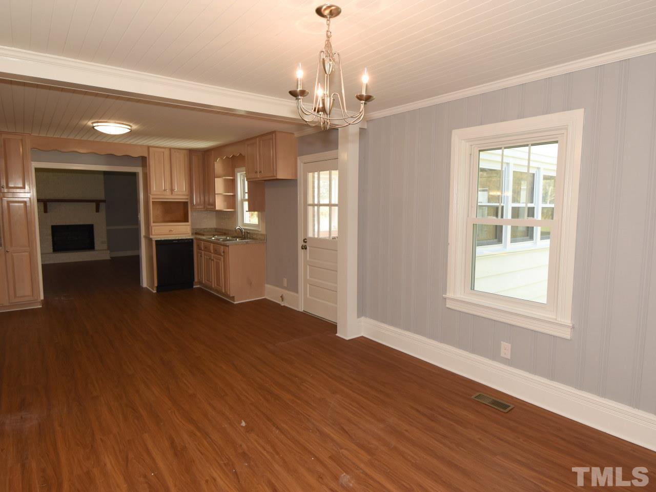 1525 Micro Road Selma, NC 27576 - Photo 20 of 25 New easycare floors, beadboard ceiling, fresh paint, new light fixtures