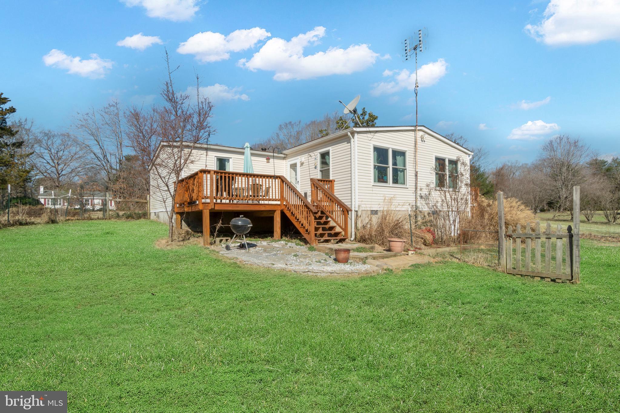 5511 Burr Hill Road Rhoadesville, VA 22542 - Photo 16 of 20 Back deck, woodland view