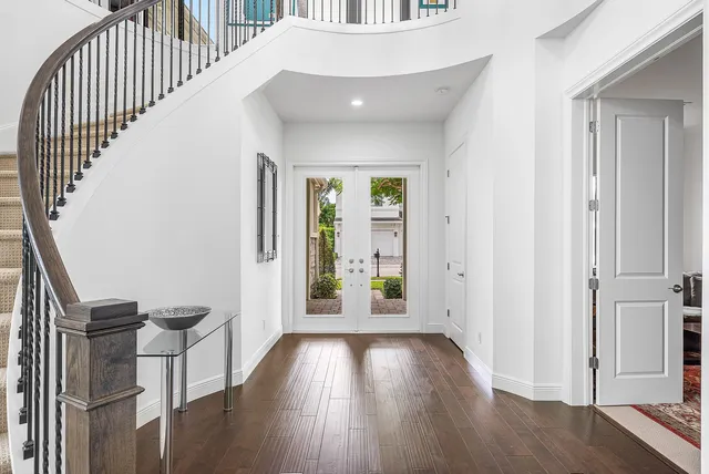 a view of entryway with wooden floor