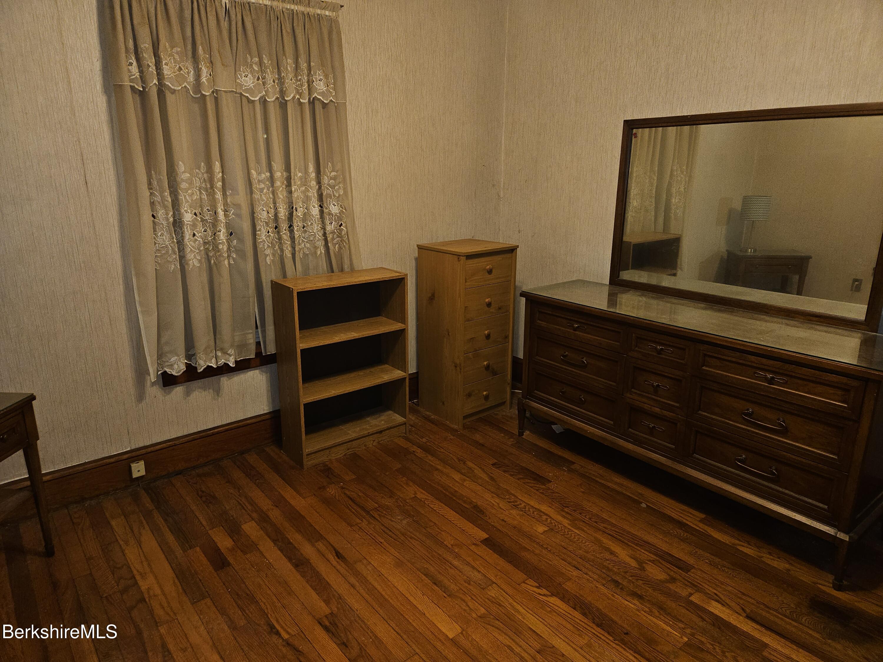 269 2nd Street Pittsfield, MA 01201 - Photo 21 of 39 a room with a bench and a window