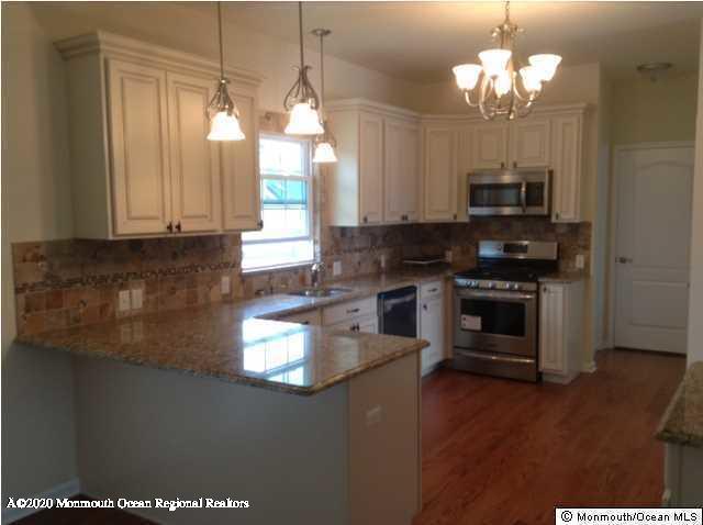 1767 Forge Pond Road Brick, NJ 08724 - Photo 2 of 6 1763 Forge Pond Rd kitchen TBB