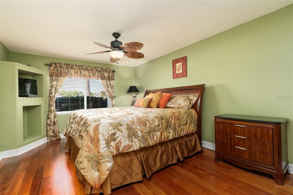 1985 Rutgers Place, Unit 1985 Port Orange, FL 32128 - Photo 17 of 56 a bedroom with a bed and window