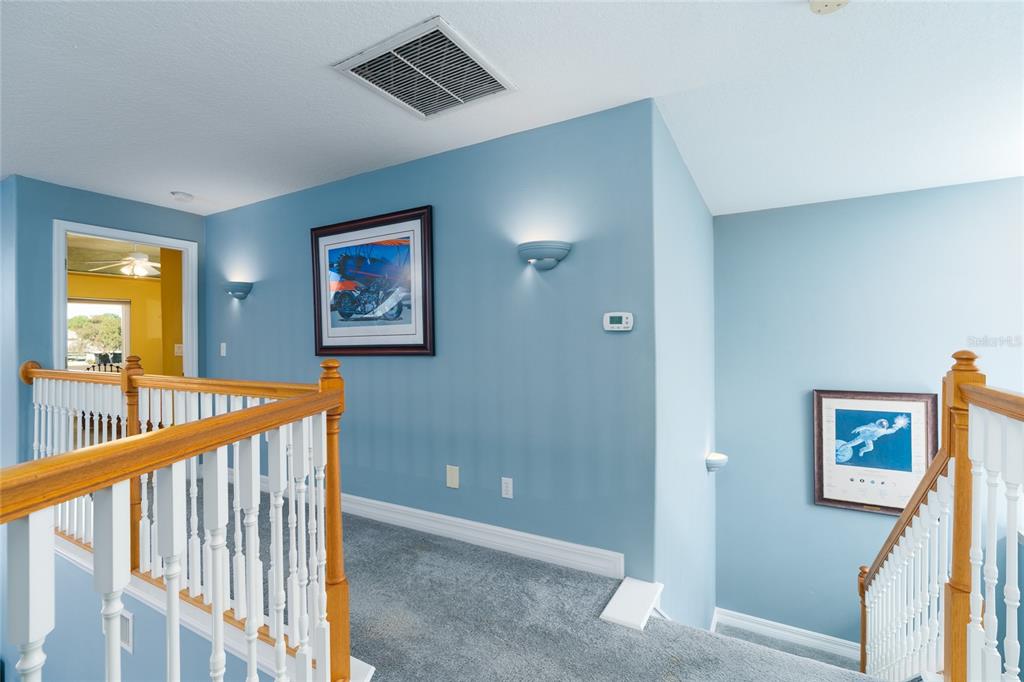 1985 Rutgers Place, Unit 1985 Port Orange, FL 32128 - Photo 22 of 56 a view of a hallway with a elevator