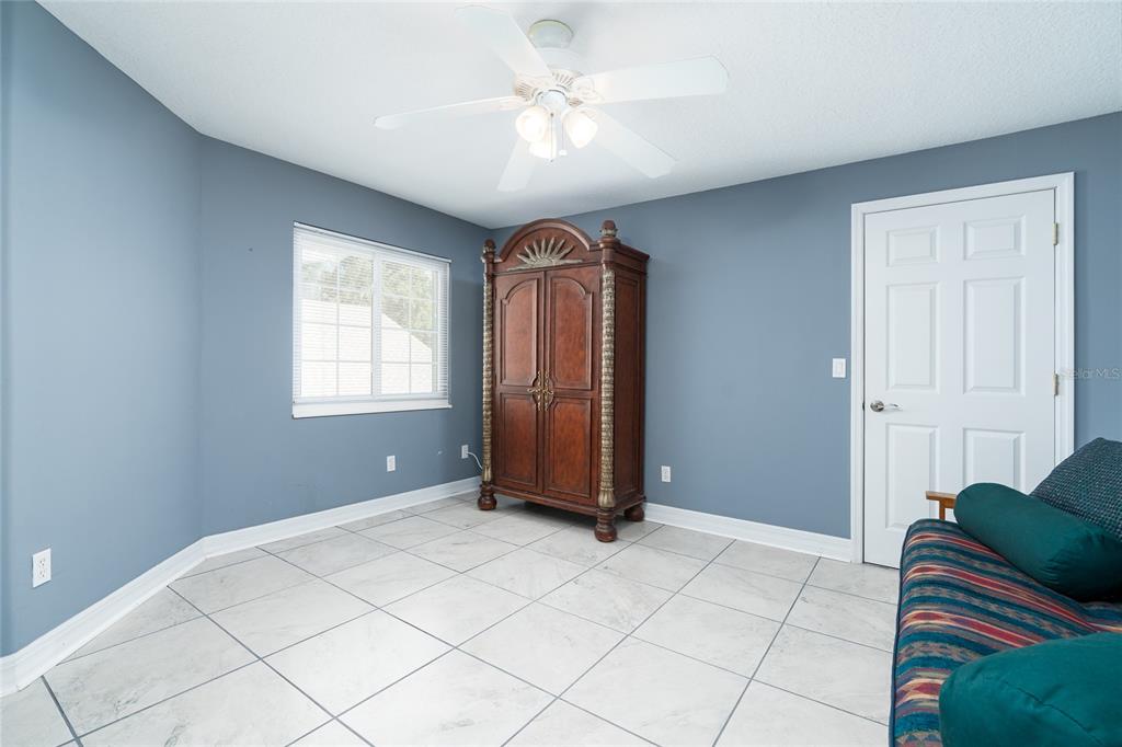 1985 Rutgers Place, Unit 1985 Port Orange, FL 32128 - Photo 27 of 56 a view of livingroom with workspace and a window