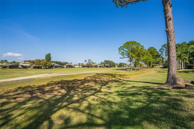 a view of a swimming pool with a deck
