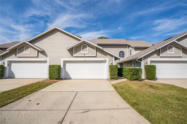 an aerial view of a house with swimming pool